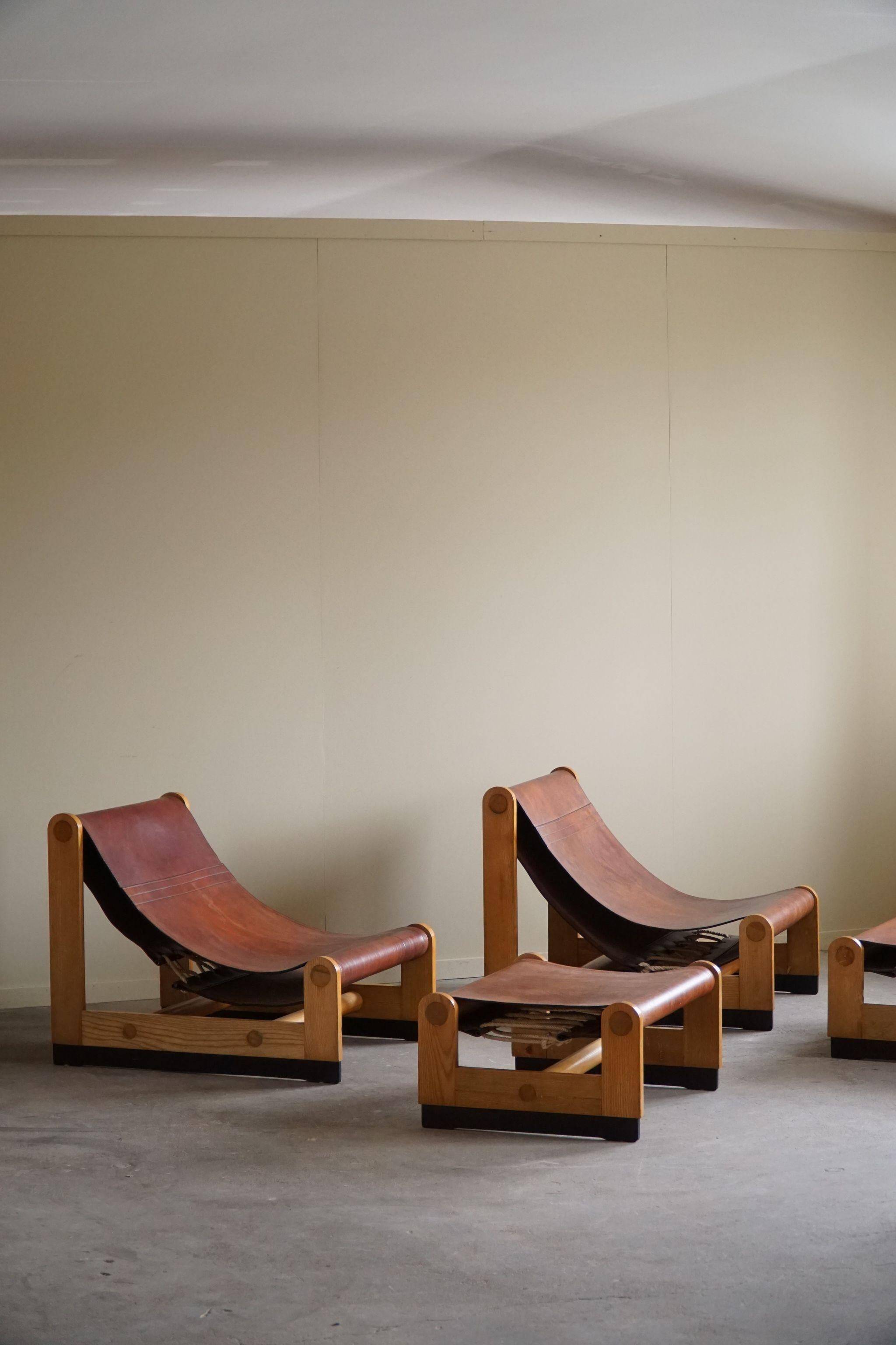 Francesco Lucianetti, Lounge chairs in leather and elm, Italian modern, 1960s