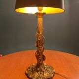 Brass foot table lamp with Tiffany style decor