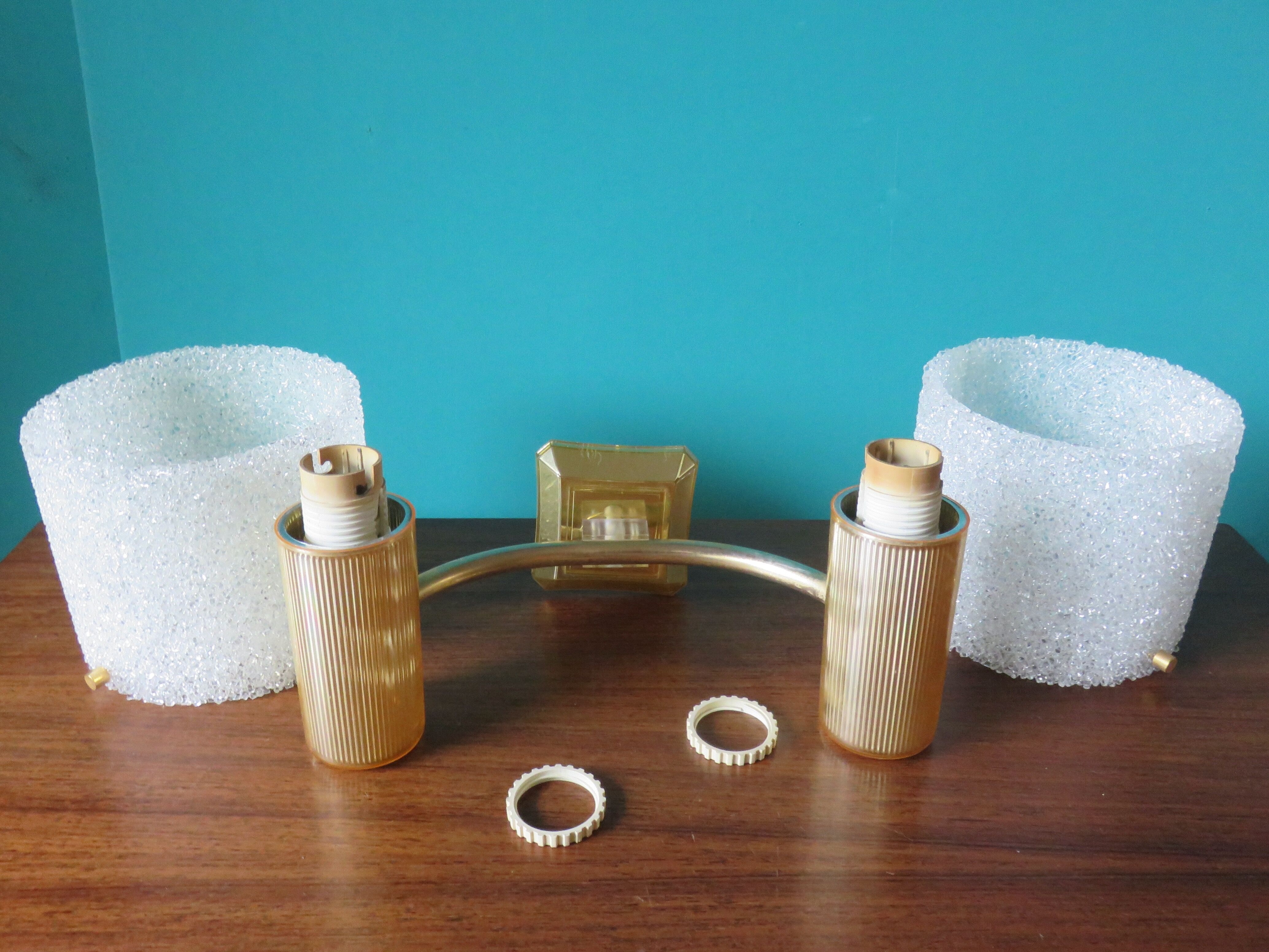 Pair of brass and gold plastic sconces with granite lampshades, France 1950
