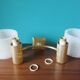 Pair of brass and gold plastic sconces with granite lampshades, France 1950
