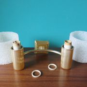 Pair of brass and gold plastic sconces with granite lampshades, France 1950
