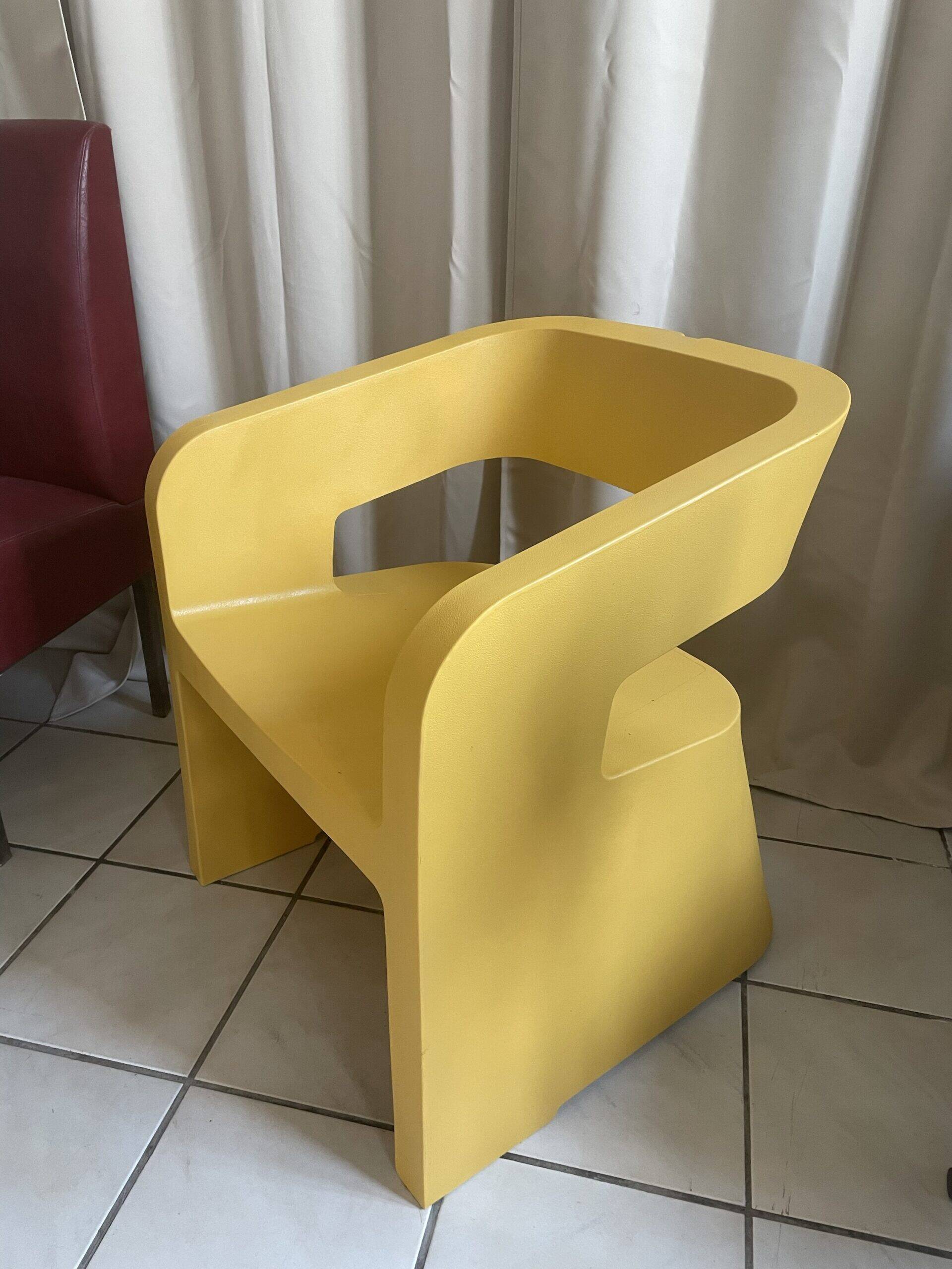 Orange-yellow designer armchair
