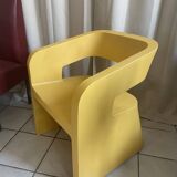 Orange-yellow designer armchair