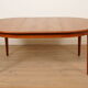 Vintage round dining table | extendable | teak | 125 - 185 cm