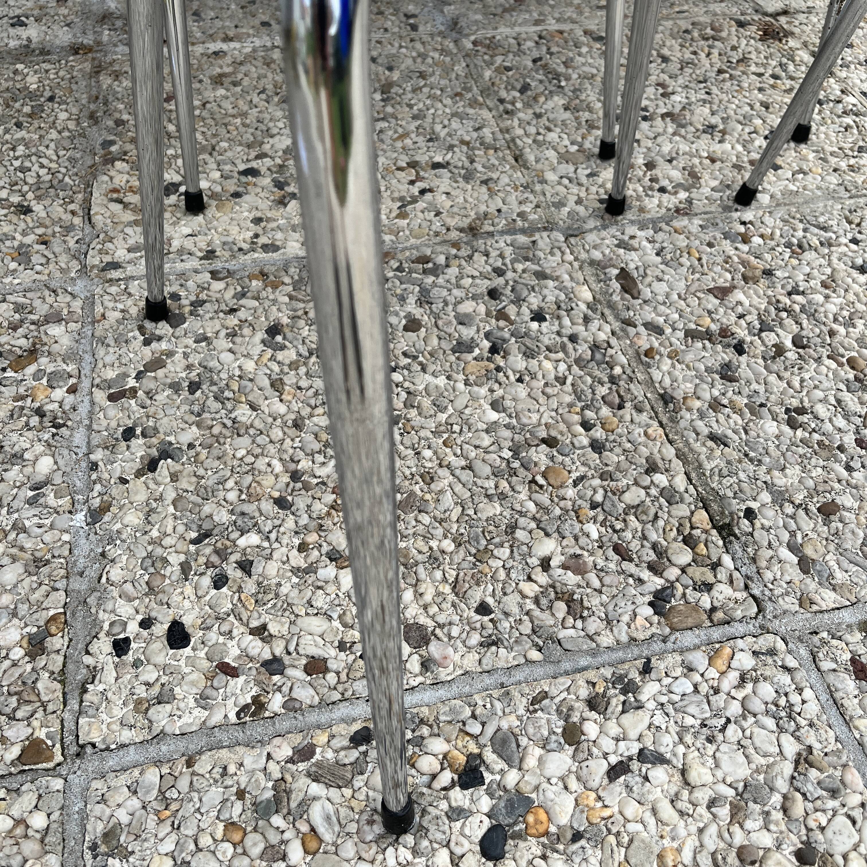 Chairs in formica red foot compass