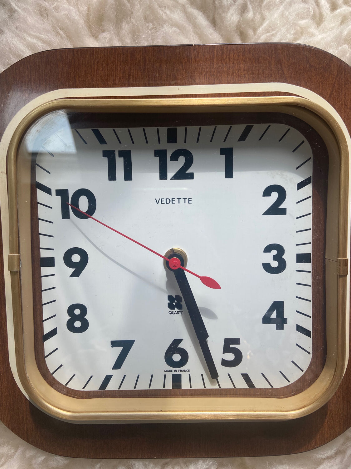 Wall clock in wood and glass 70s