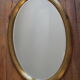 Oval mirror bevelled wood gold 80 x 55 cm