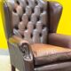 Dark Brown leather chesterfield wing chair with Ottoman