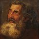 Old painting of a male face in oil on cardboard from the 19th century.