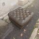 Pair of Chesterfield armchairs with footrest
