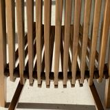 Foldable designer armchair in wooden slats