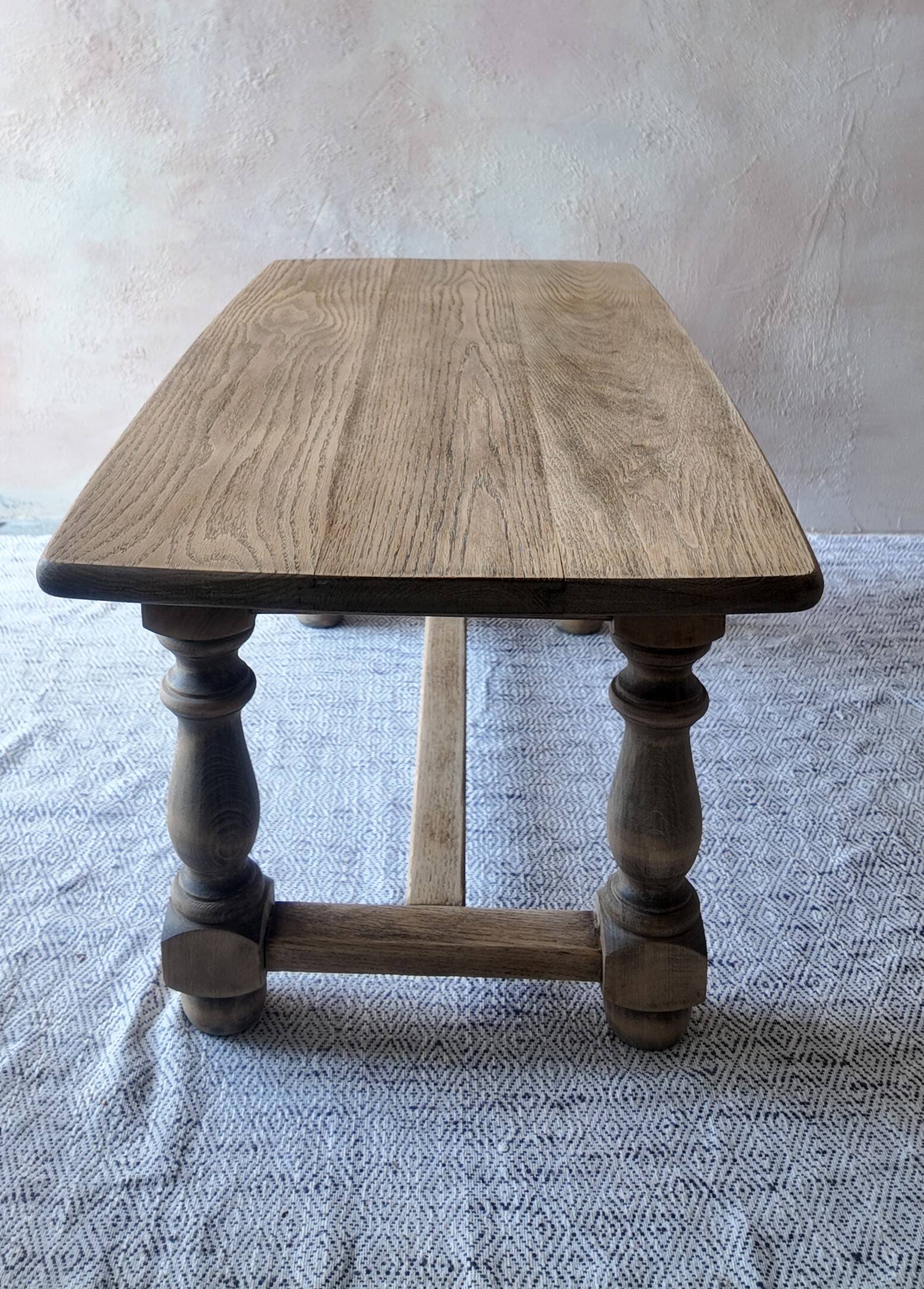 Old farmhouse coffee table in solid oak - turned legs and stretcher.
