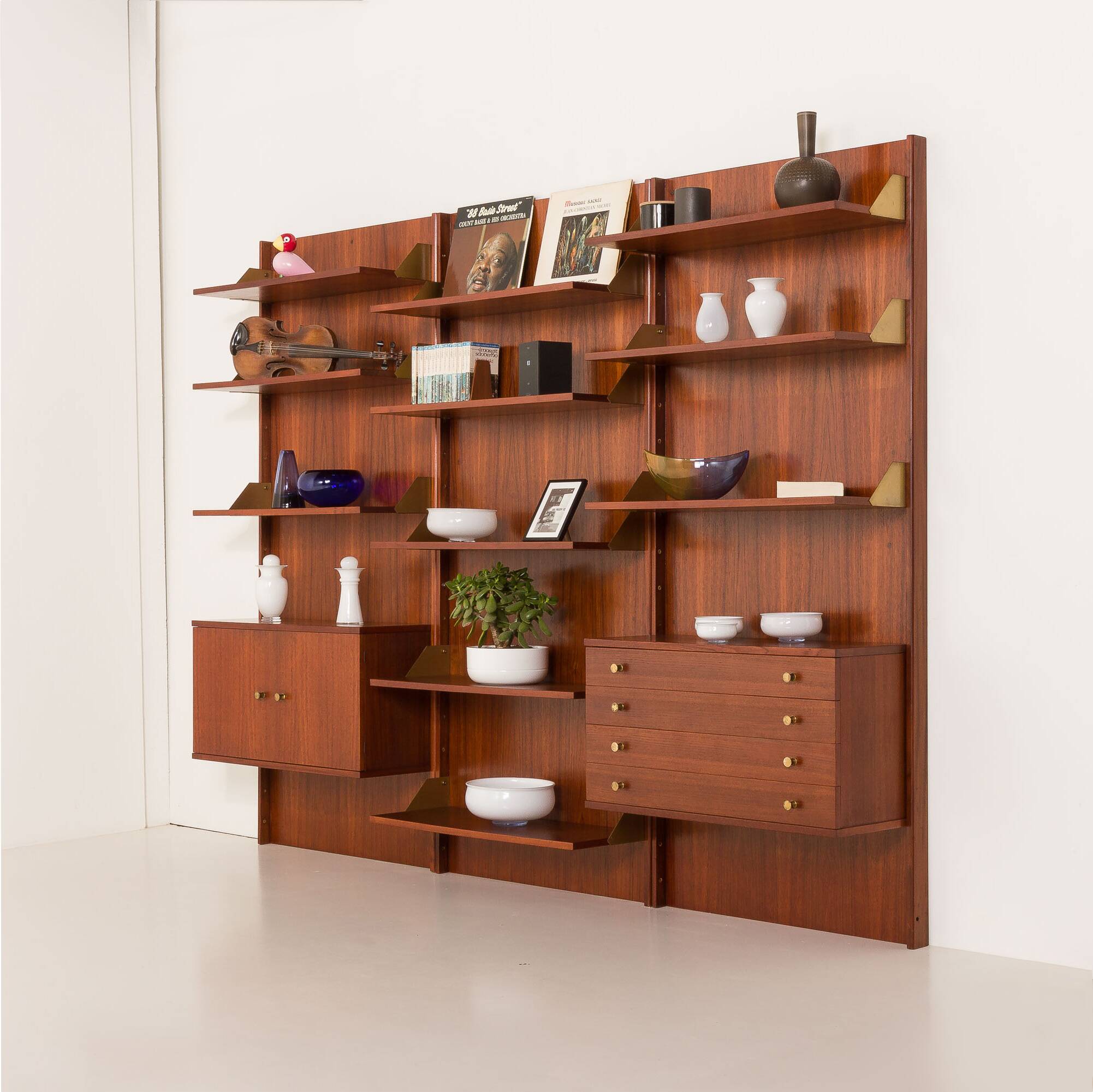 Italian mid-century teak wall unit on panels, 1970s