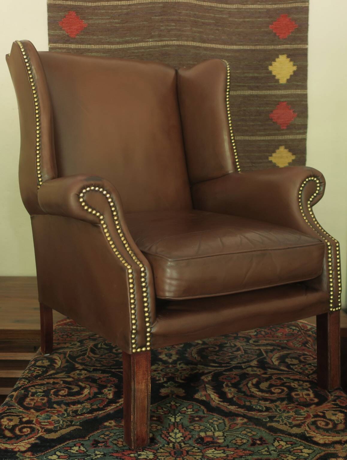 Vintage wingback lounge chair in brown leather, 1970s