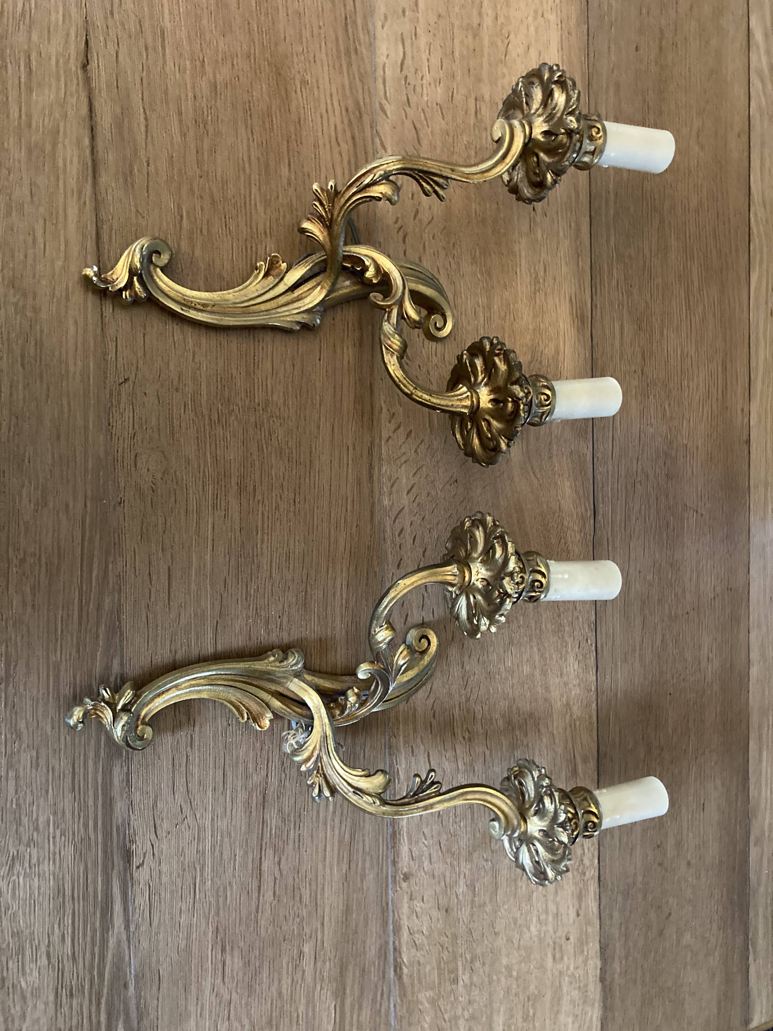 Pair of bronze wall lamps