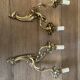 Pair of bronze wall lamps