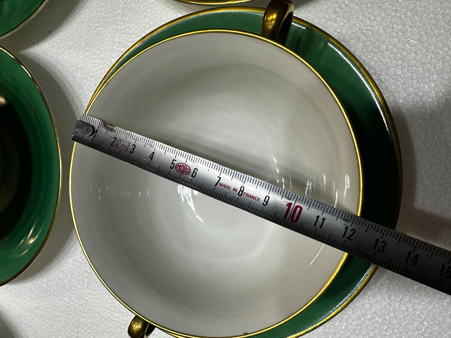 Service 14 cup and saucer in Art Deco Emerald Green and Gold.