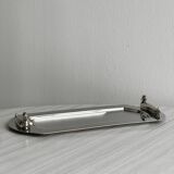 Shiny metal foie gras dish