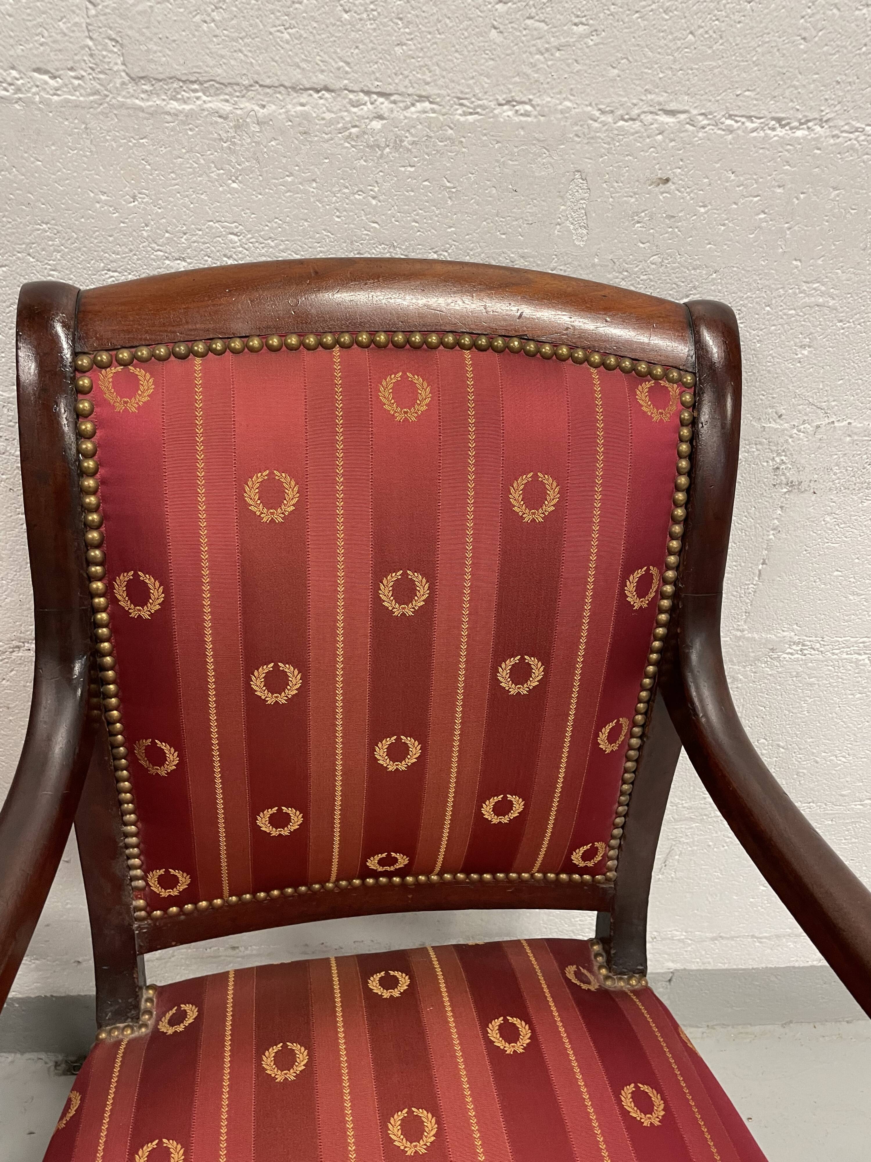 Pair of empire period armchairs in mahogany and silk