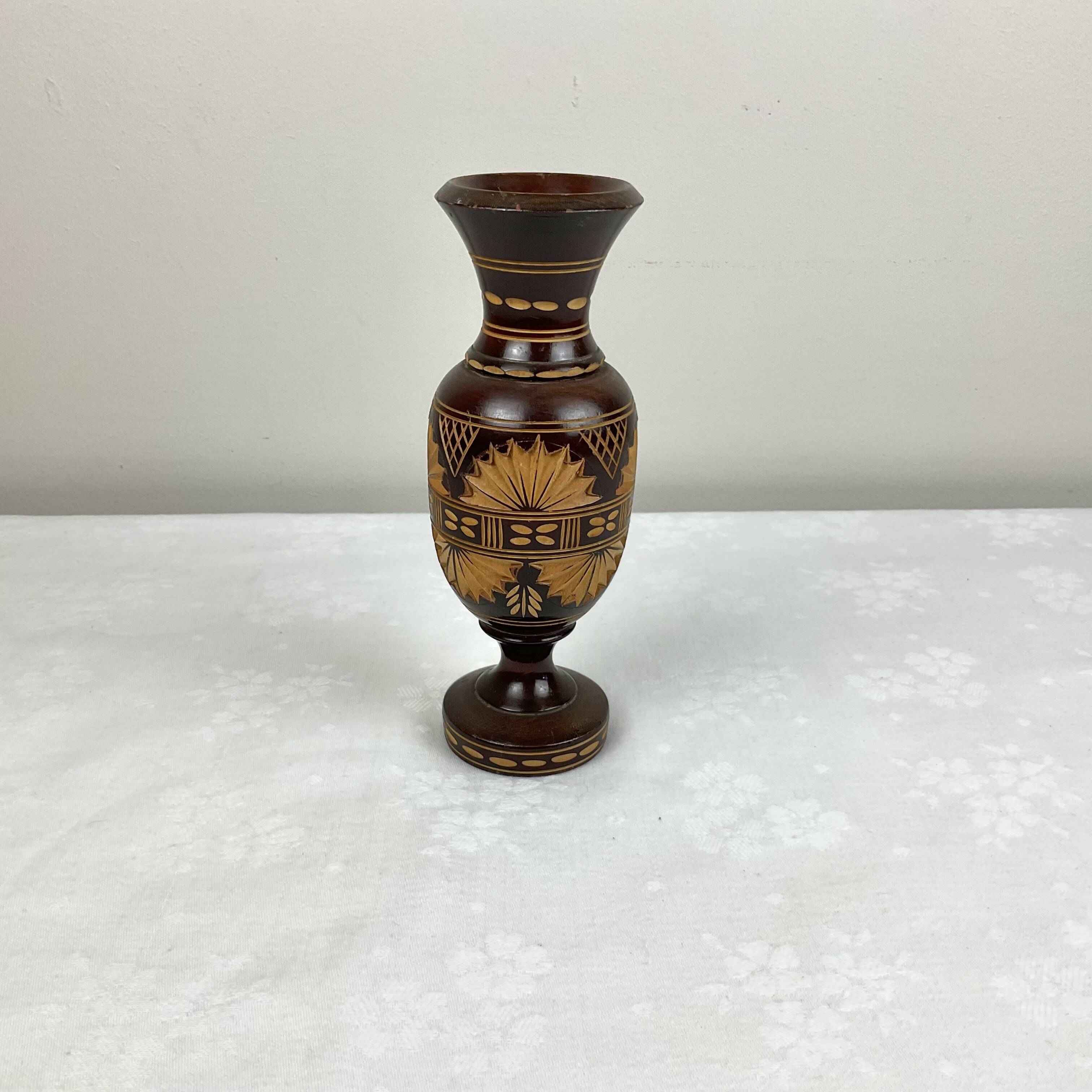 Carved wooden vase