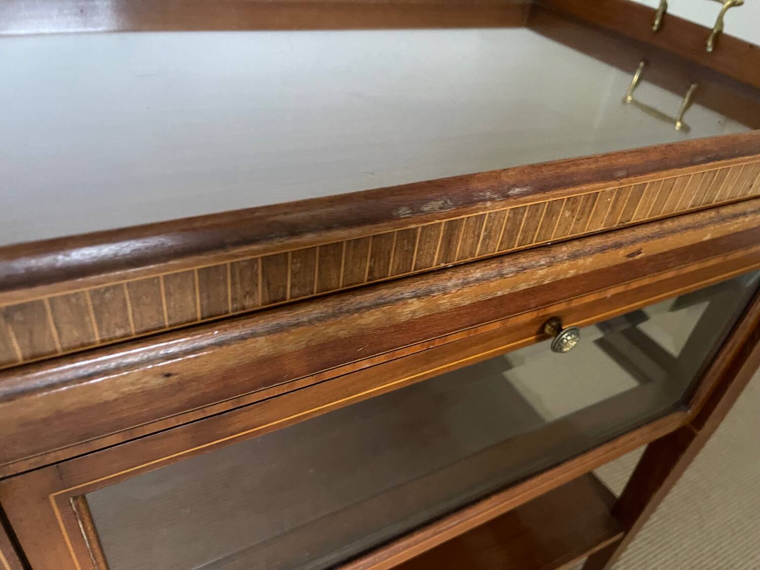 Serving Light mahogany English tea table. Beveled windows. circa 1900. Removable glass top.