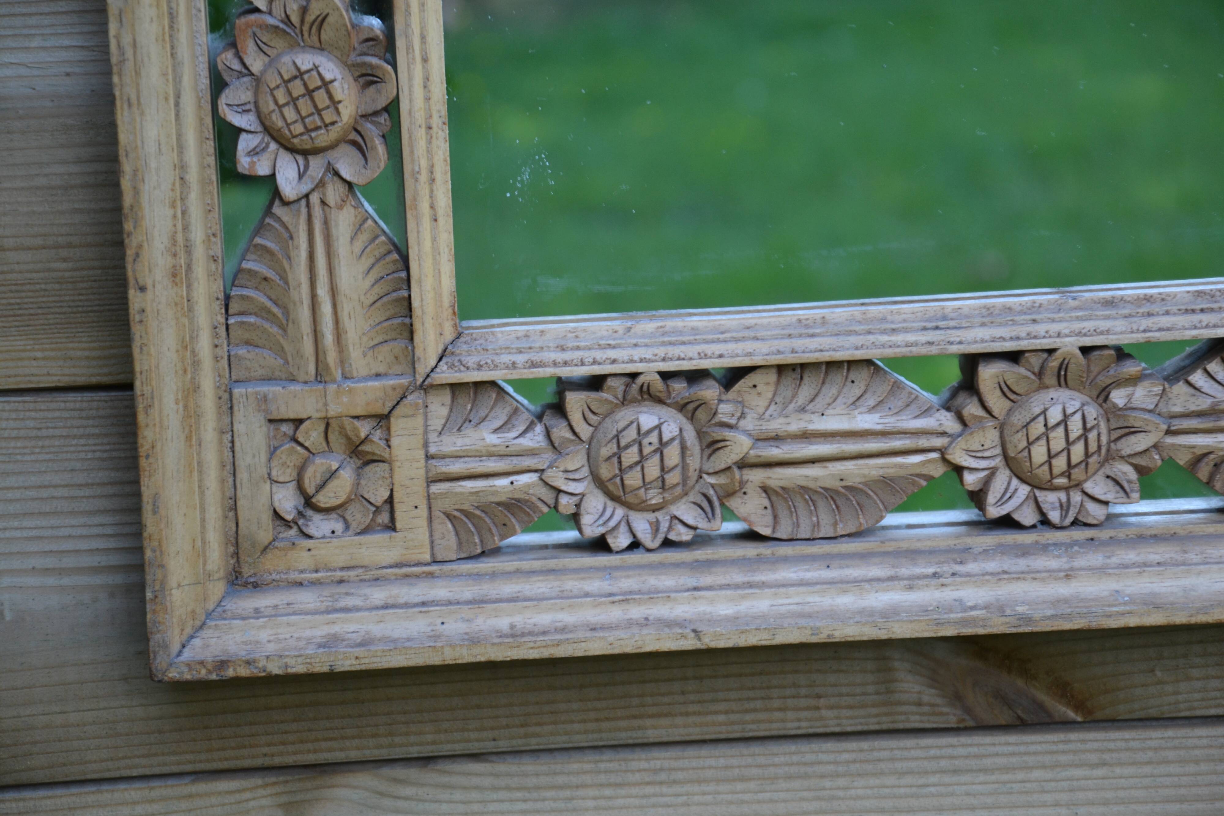 Large carved wooden mirror