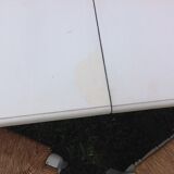 White farmhouse table set and four chairs