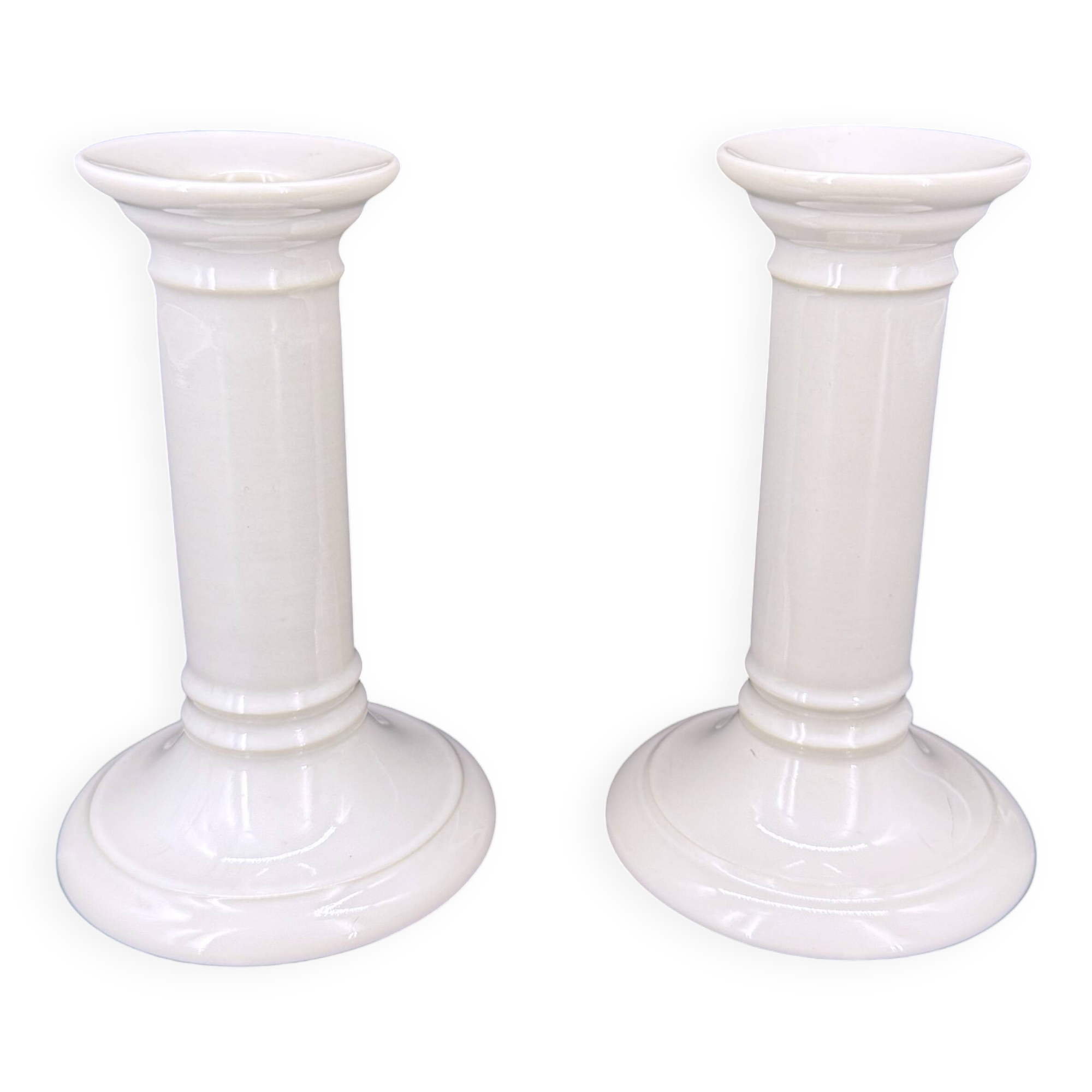 Pair of white earthenware candlesticks – Doulton, England, early 20th century