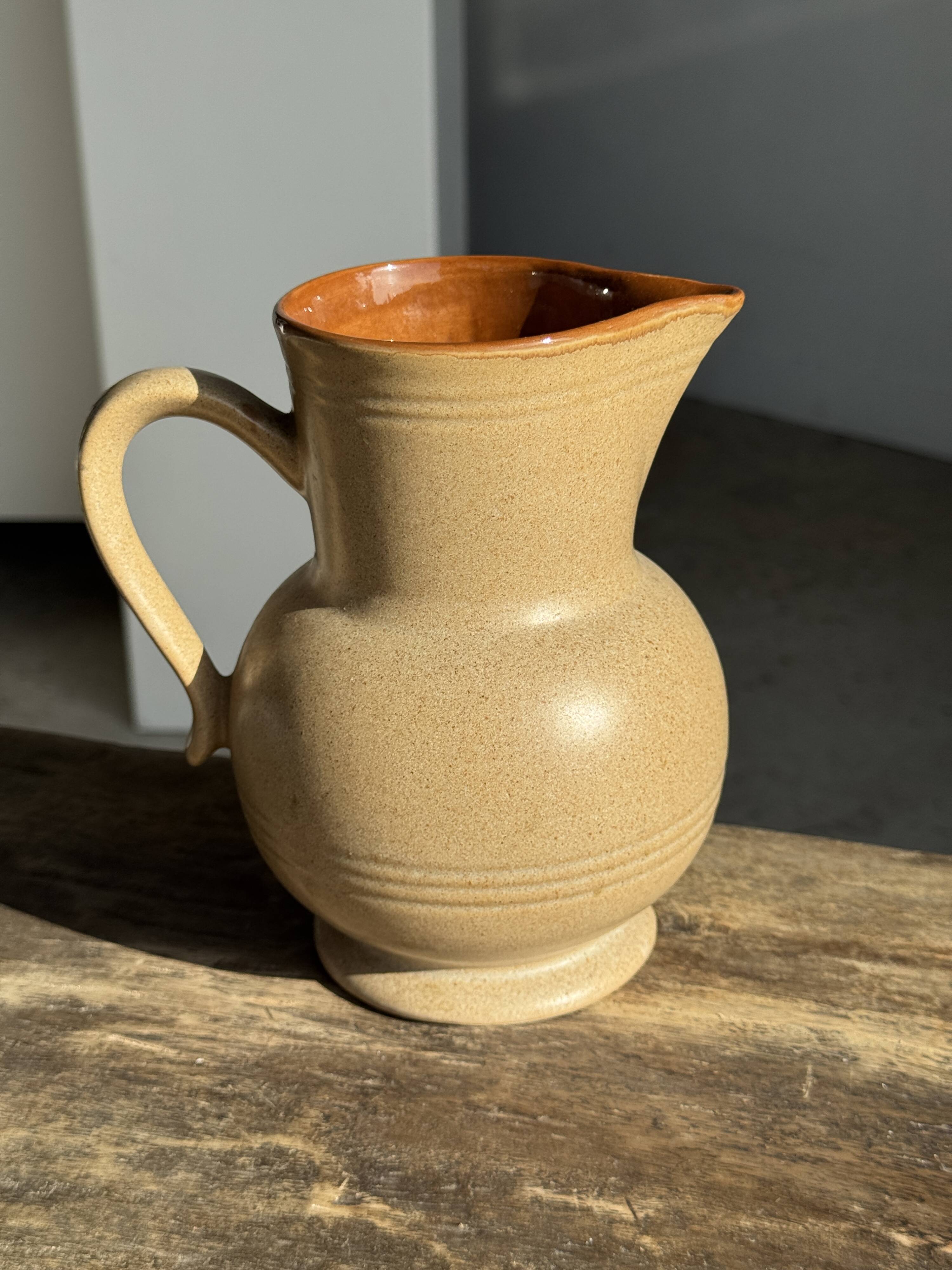 Vintage stoneware round carafe