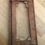 Oil on canvas with lily decoration in frame