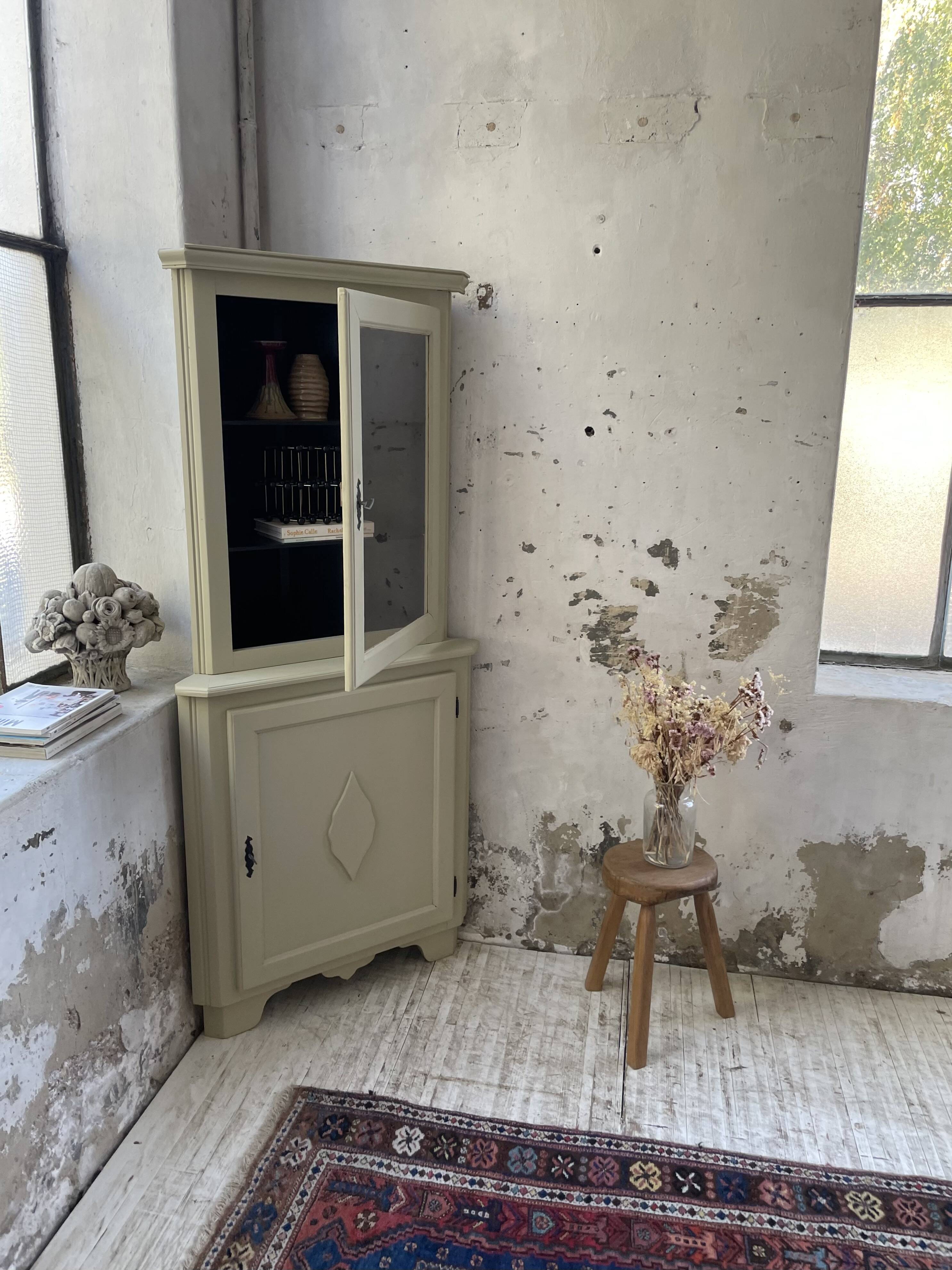 Corner display cabinet from the 1950s