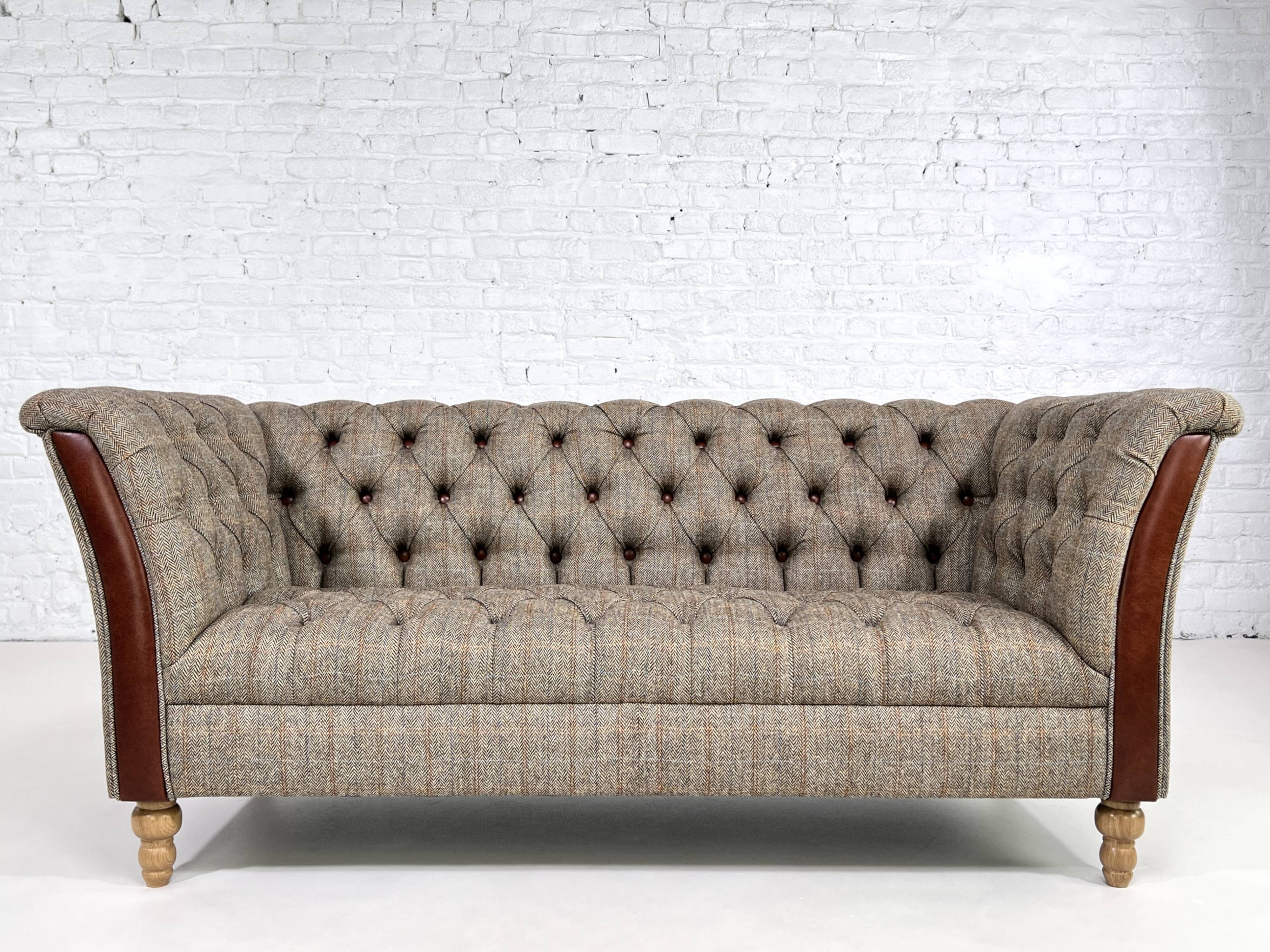 Chesterfield sofa in leather, fabric and wood