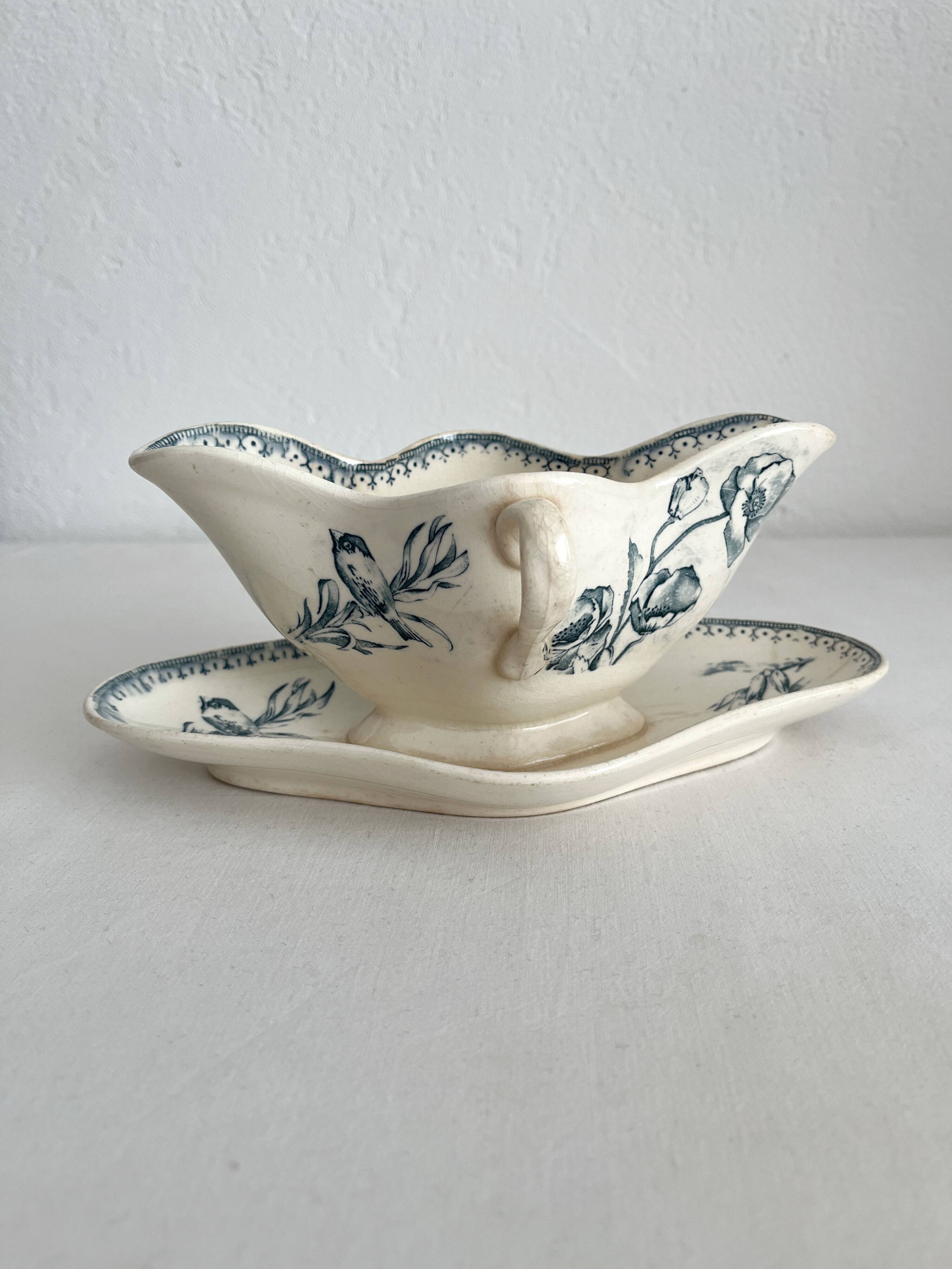 Antique iron earthenware sauceboat with flowers and birds "Malaga" Petrus Regout