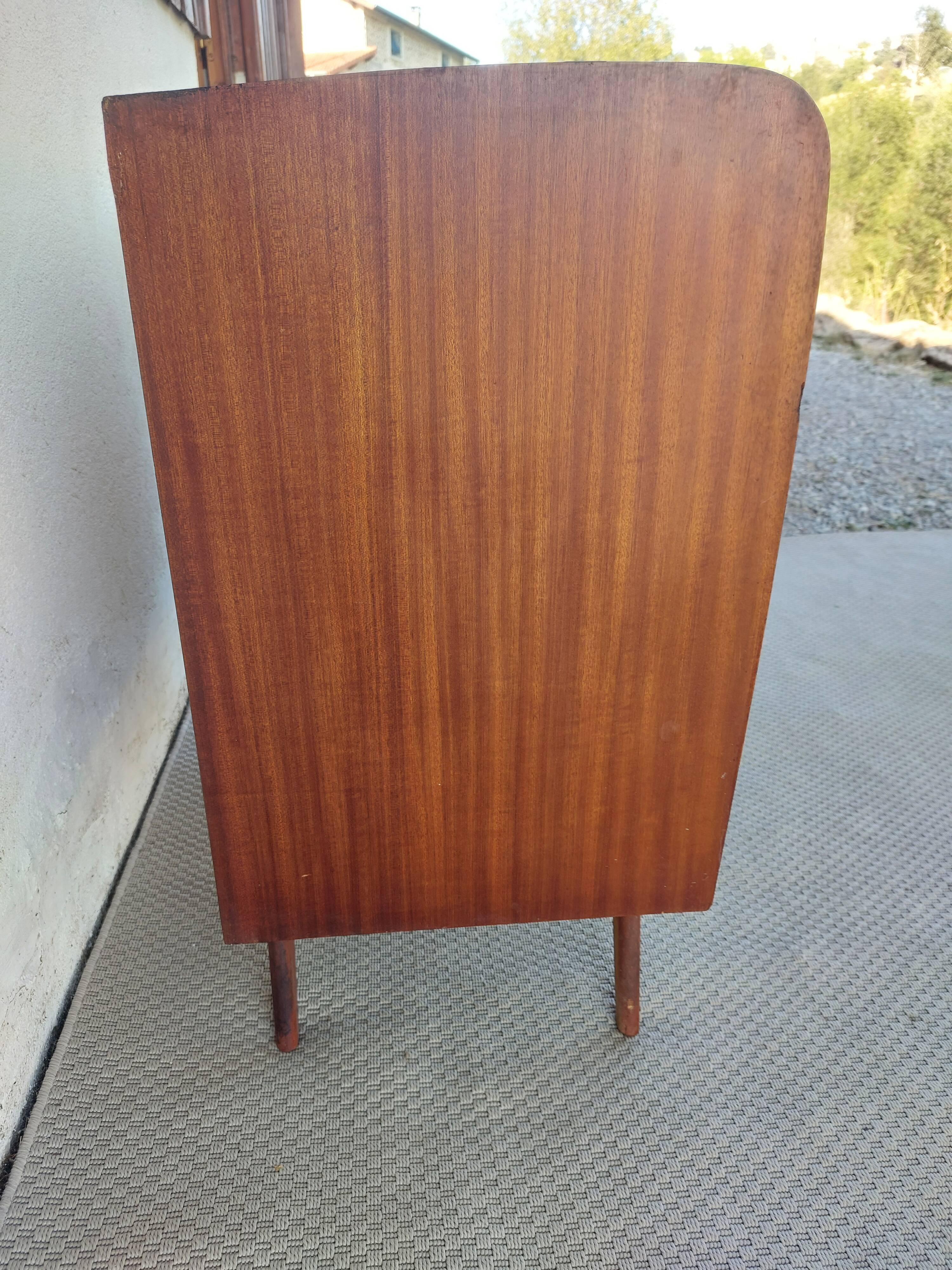 commode aux pieds compas, effet miroir, vintage