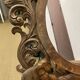 Carved mirror with integrated shelf
