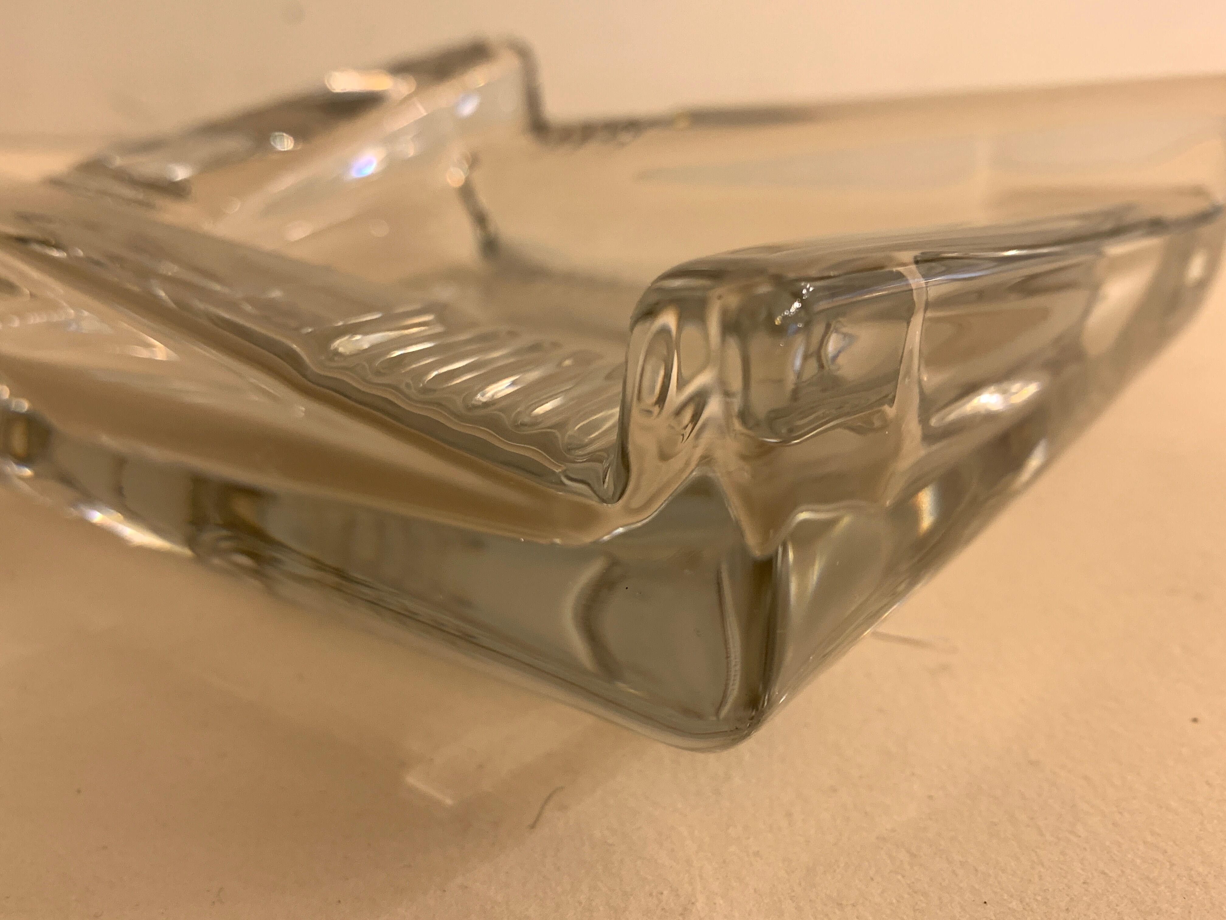 Transparent moulded glass ashtray