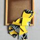 Wooden frame puzzle from the 1940s/50s depicting a cat on a yellow background.