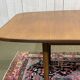 G-Plan teak table from the 1970s with butterfly extension.