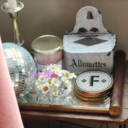 Rectangular mirror tray with wooden handles and gilding.