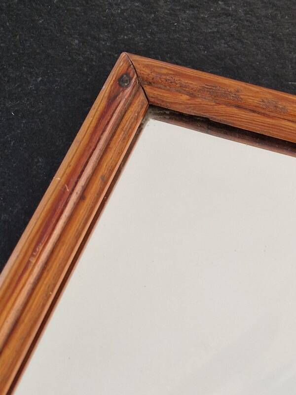 Carved wooden mirror from the Napoleonic III era in fir or pine from the 19th century.
