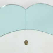 Two-tone glass console mirror with gilded brass. Circa 1950.