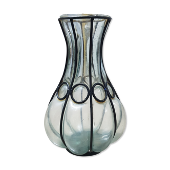 Blown glass vase and wrought iron