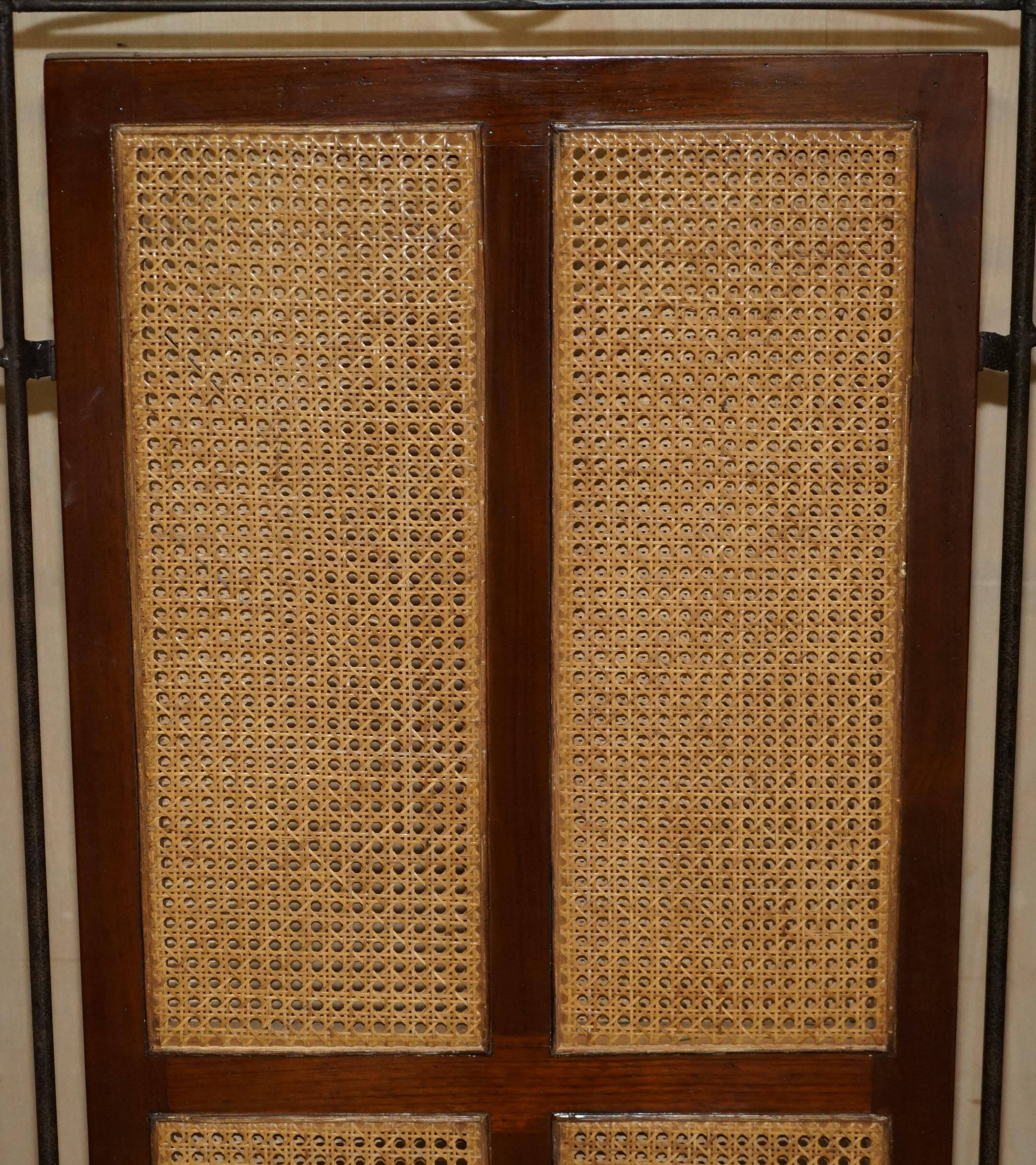 Vintage 3-panel wrought iron screen, bergère and hardwood.