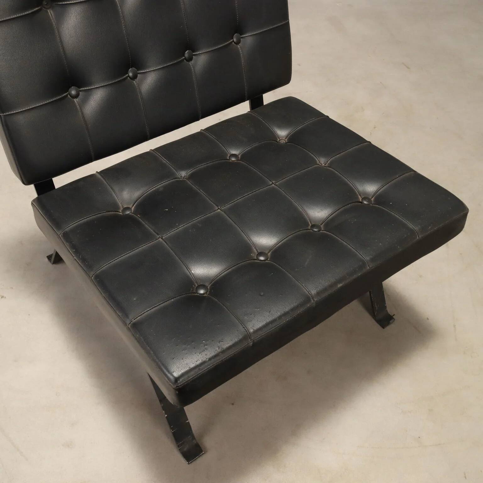 Vintage armchair in metal and black faux leather, Italian design from the 1970s.