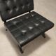 Vintage armchair in metal and black faux leather, Italian design from the 1970s.