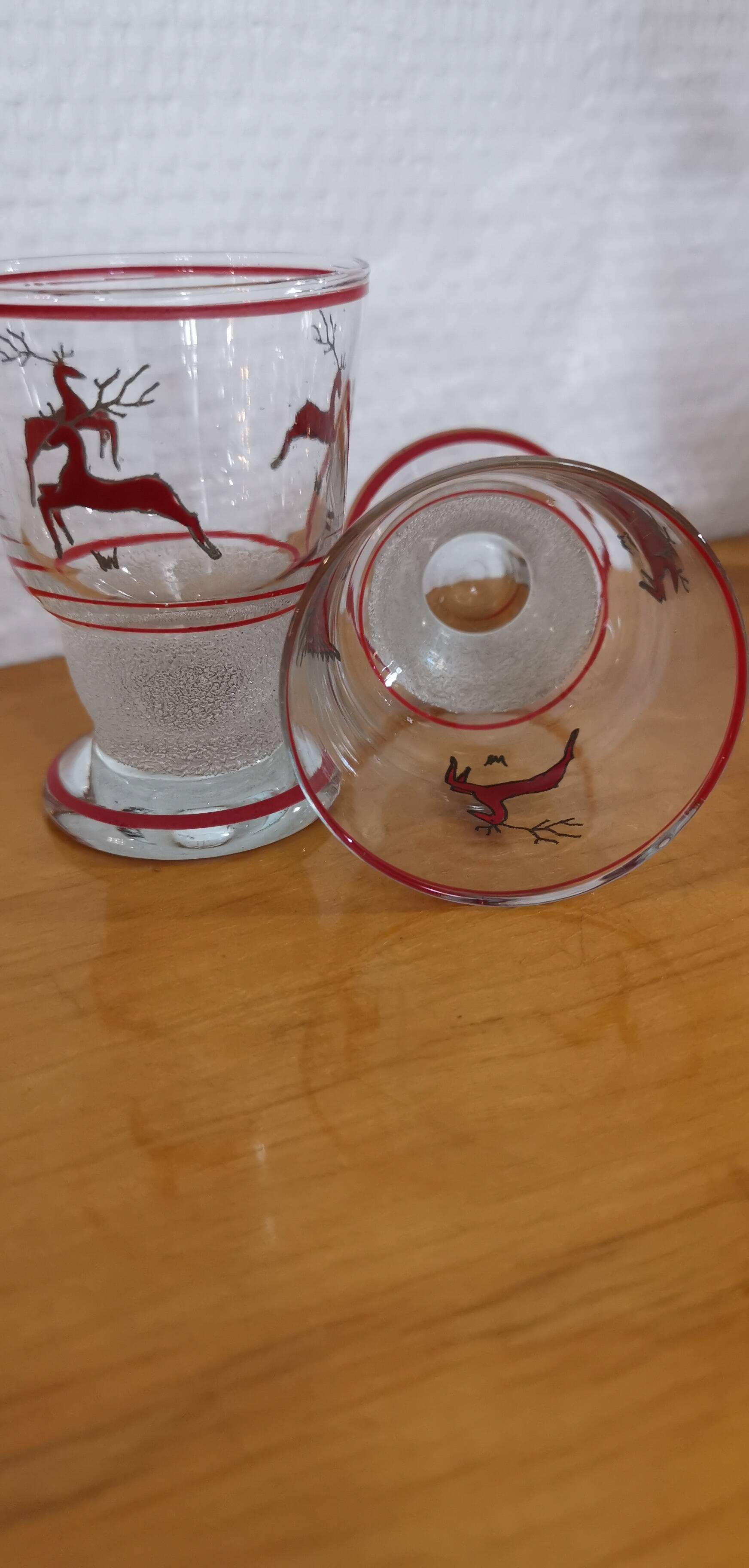 Glasses and carafe decorated with red Christmas reindeer and white granita 60's
