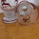 Glasses and carafe decorated with red Christmas reindeer and white granita 60's
