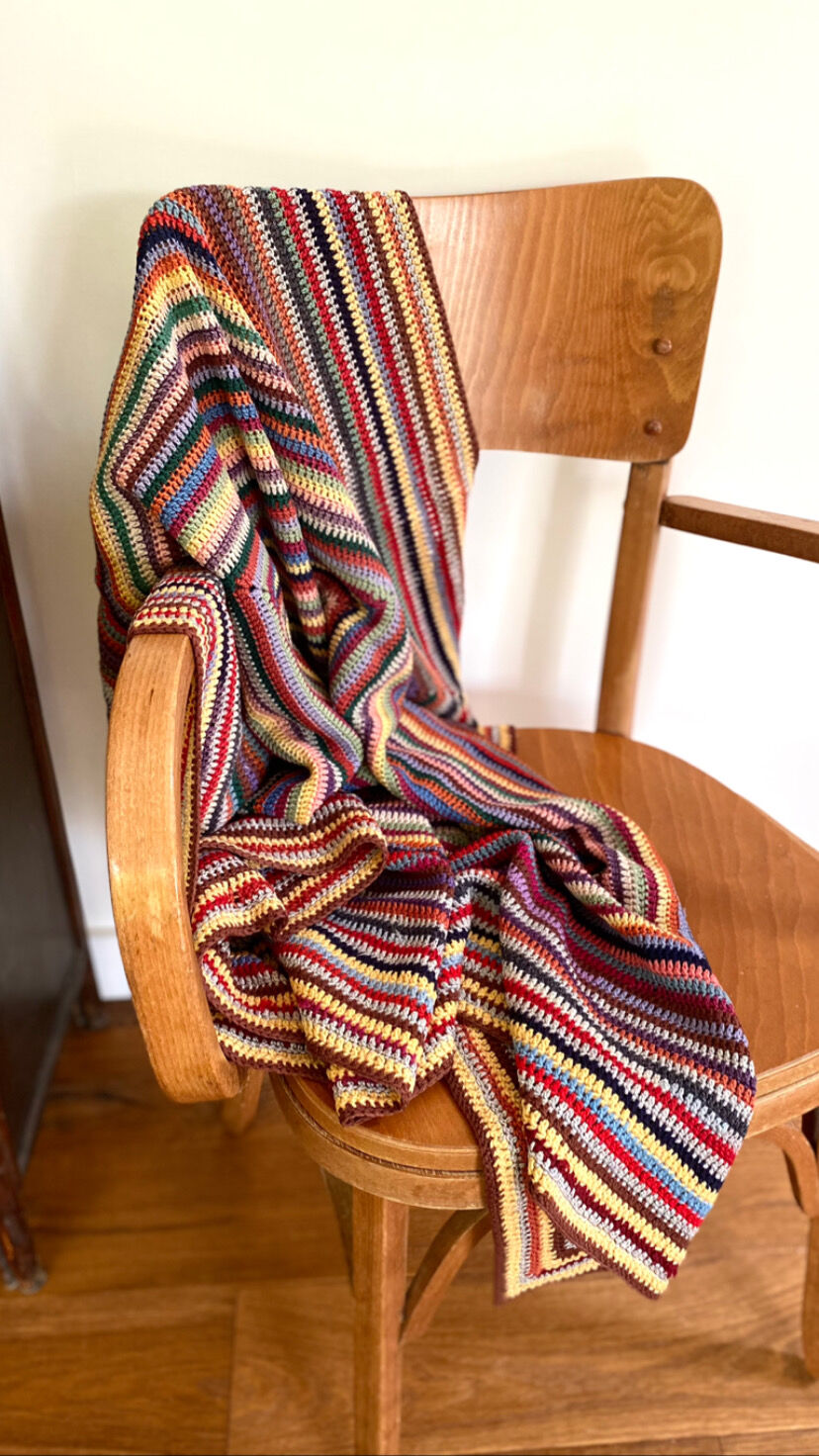 Hand crocheted wool blanket plaid