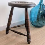 Tripod stool in turned wood, attributed to Charles Dudouyt, 20th century.