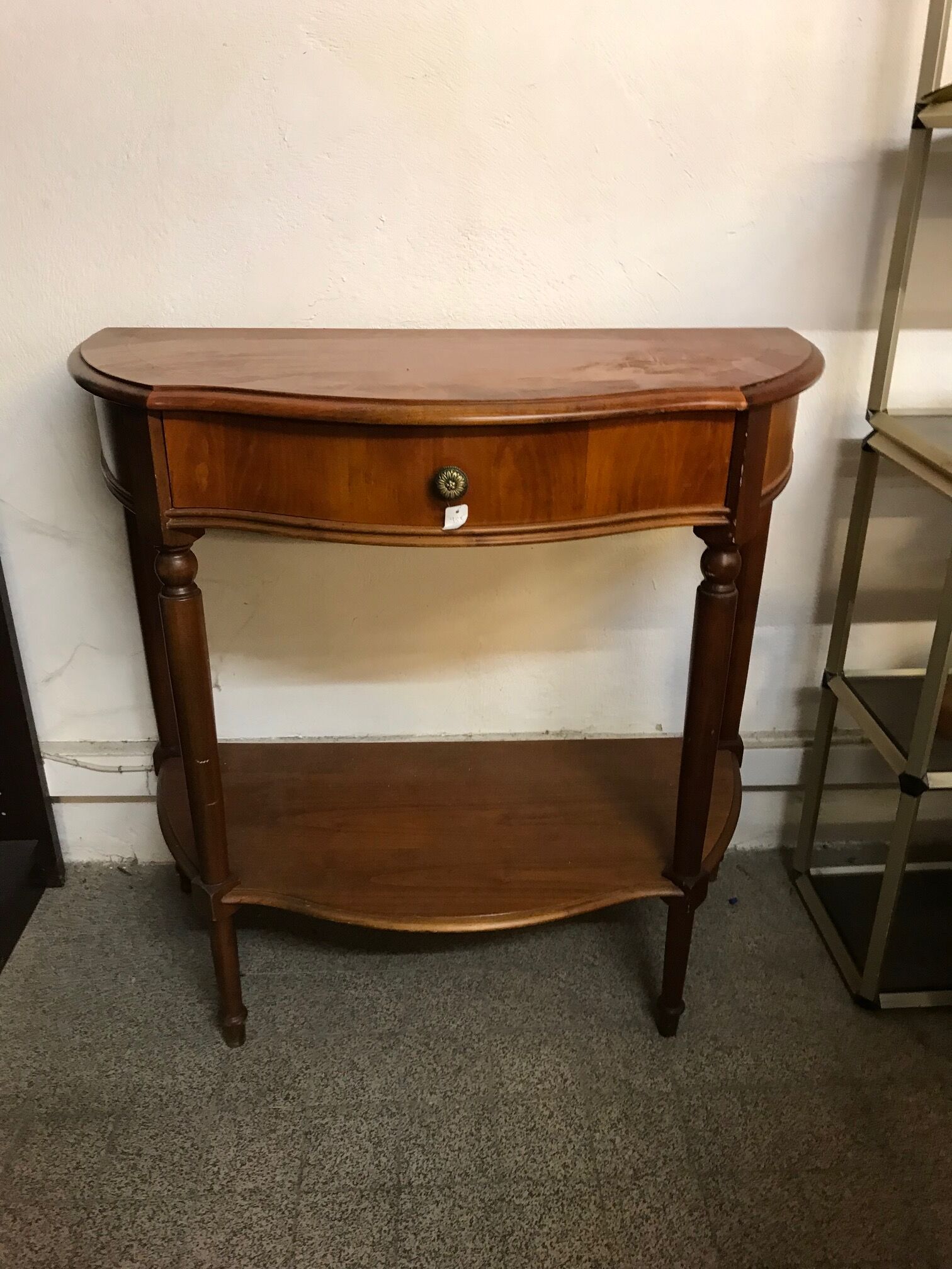 Cherry half-moon console with drawer and bottom shelf